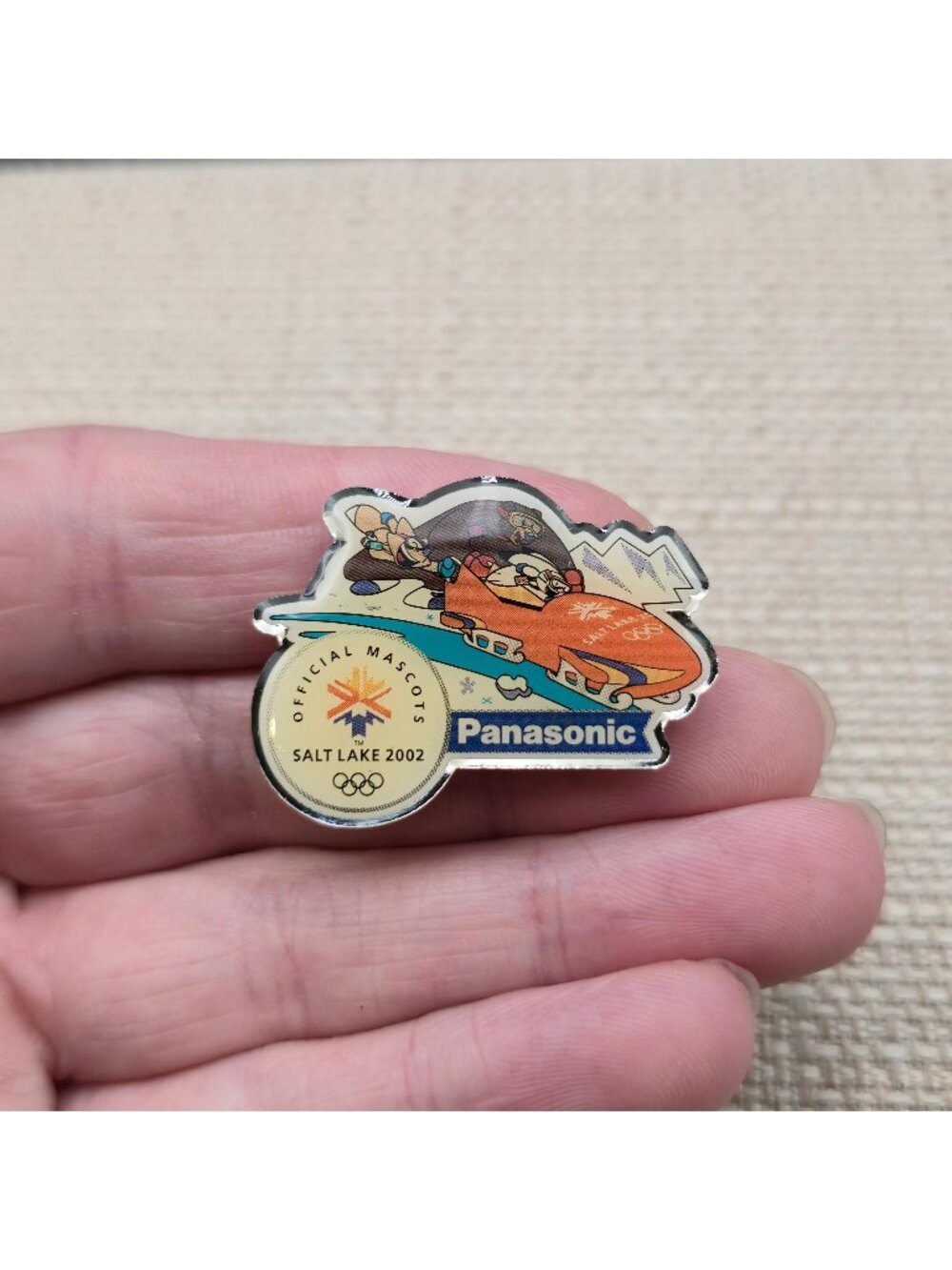 Salt Lake 2002 Olympics Panasonic Mascot Bobsled Pin Winter Games Souvenir A8756